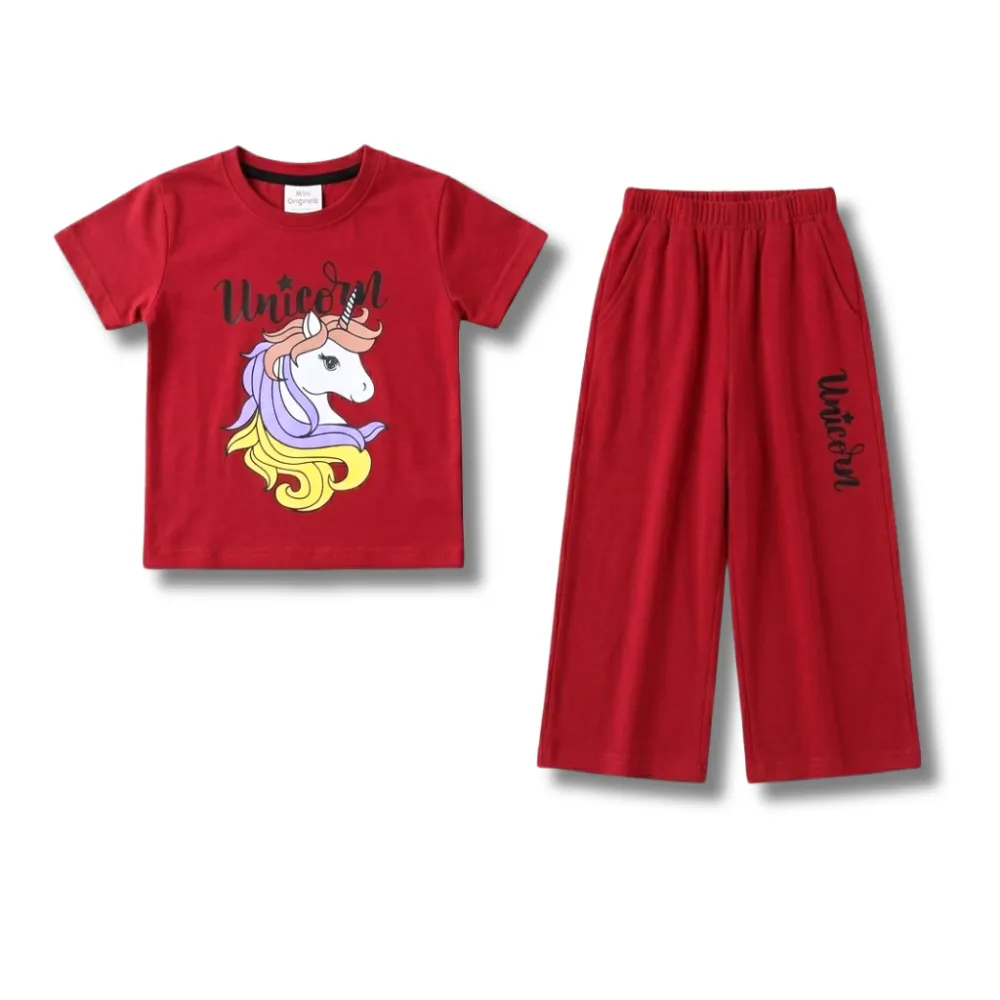 Vibrant red short-sleeve t-shirt and matching wide-leg pants set for children, featuring a colorful unicorn head graphic with a purple and yellow mane on the t-shirt, alongside 'Unicorn' text. The comfortable cotton blend pants also have 'Unicorn' printed vertically, making it an ideal girl's casual outfit.