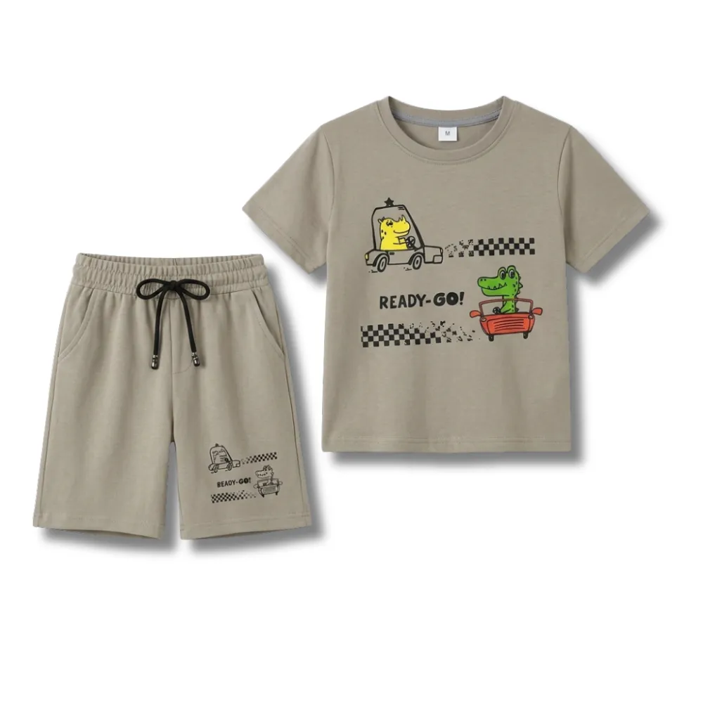 Kids beige cotton blend t-shirt and shorts set with racing animal graphic print featuring a yellow dinosaur in a car and a green crocodile in a red car, 'READY-GO!' text, and checkerboard details, perfect for toddler boys casual summer wear.