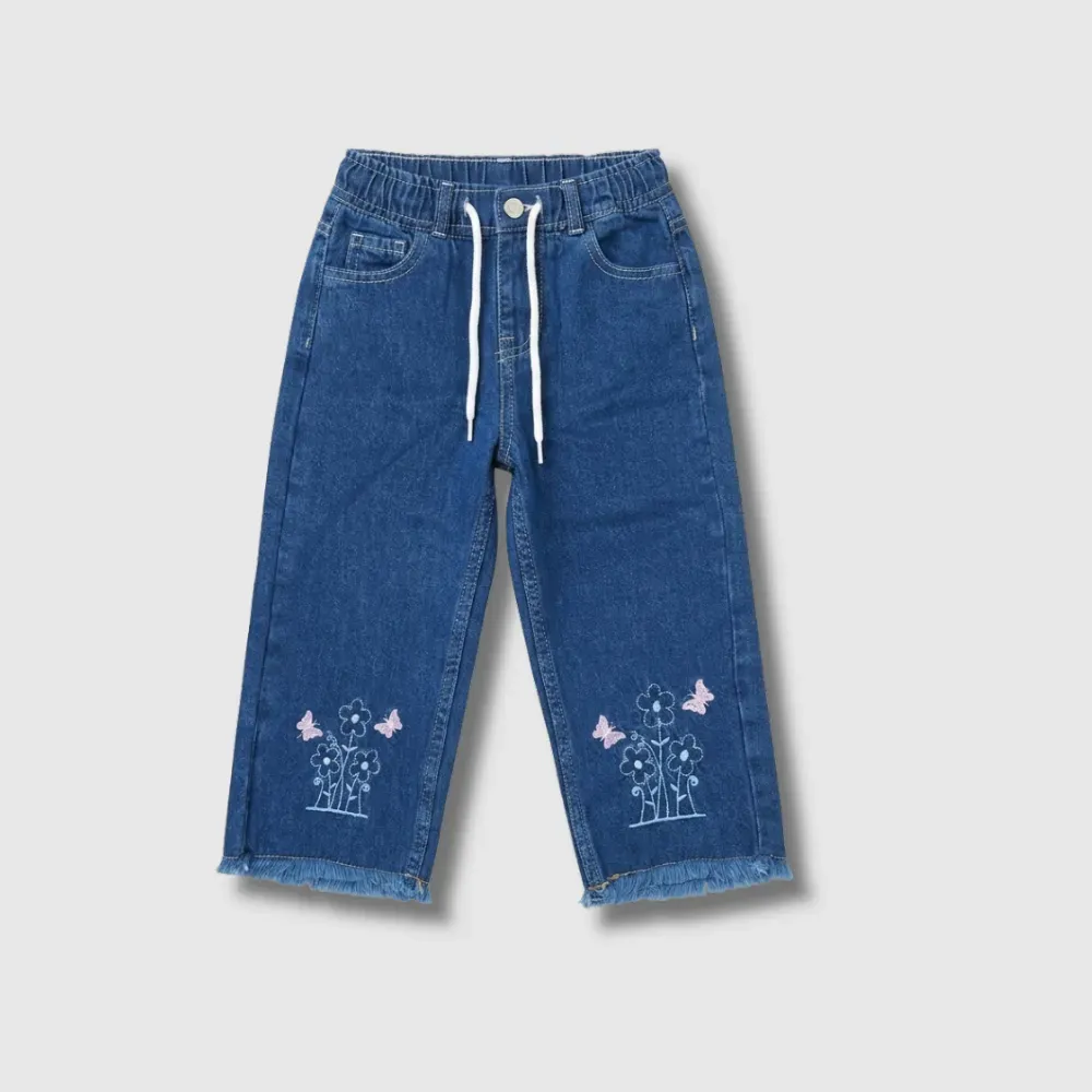 blue denim capri pants with white drawstrings, frayed hem, and embroidered flowers and butterflies on the legs.