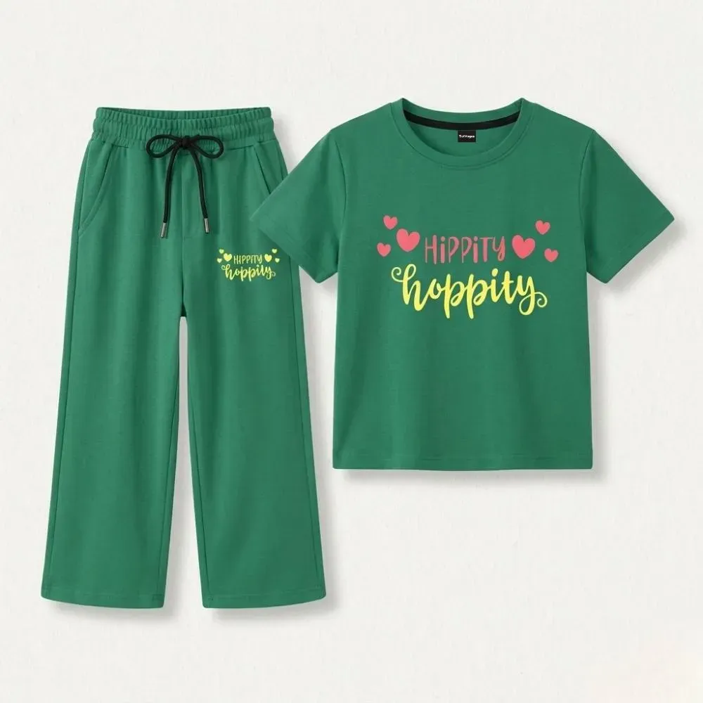 Green tracksuit with 'Hippity Hoppity' print, featuring green pants with black drawstring and green t-shirt with pink hearts.