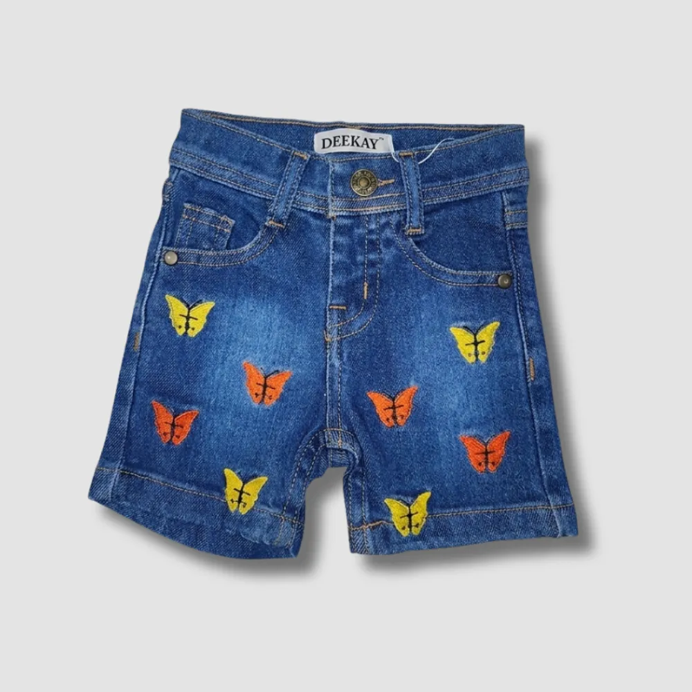Blue denim shorts with colorful butterfly designs, DEEKAY brand, front view.