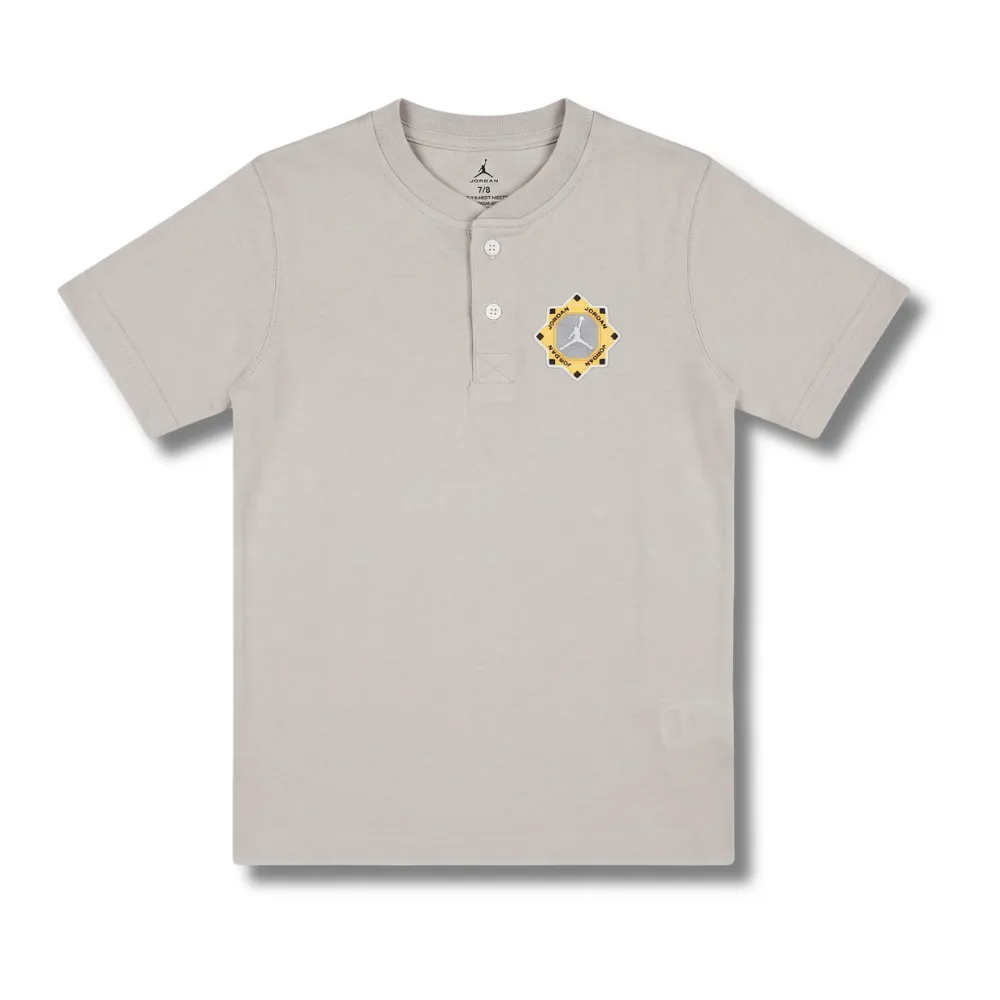 beige short-sleeved polo shirt with Jordan logo on chest