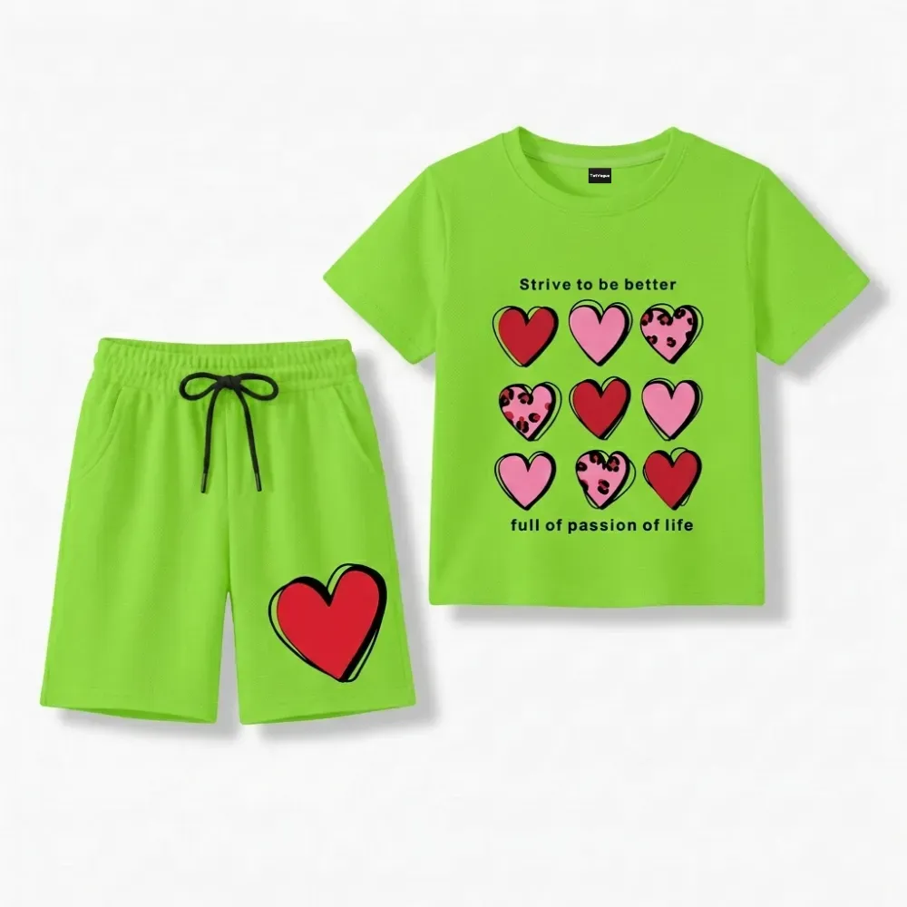 Lime green children's casual wear set with heart designs and motivational text on t-shirt.