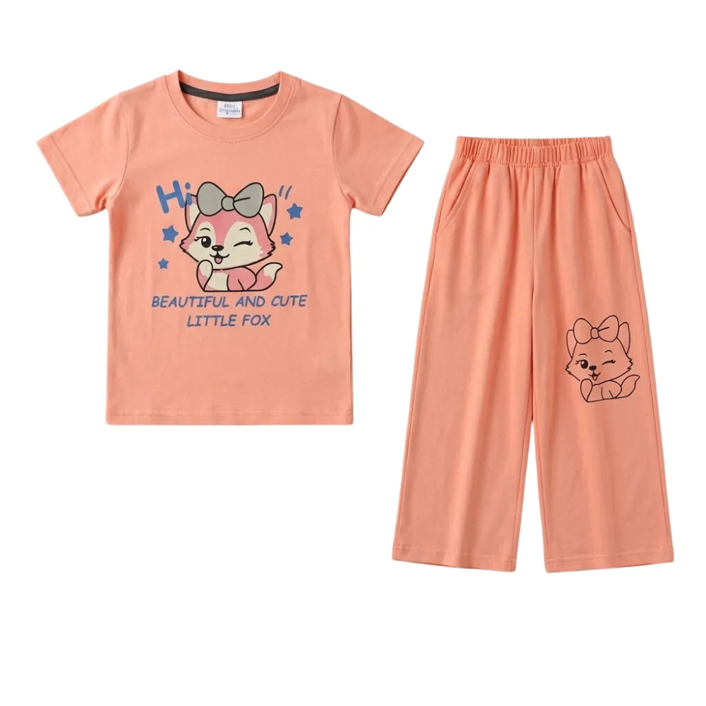 Girls' peach short-sleeve pajama set with a cute winking fox graphic and text. The cotton blend t-shirt features a large cartoon fox with a bow and stars, along with 'Beautiful and Cute Little Fox'. The matching wide-leg pants have an elastic waistband, pockets, and a small fox outline, perfect for toddler and young girls' sleepwear or comfortable loungewear.