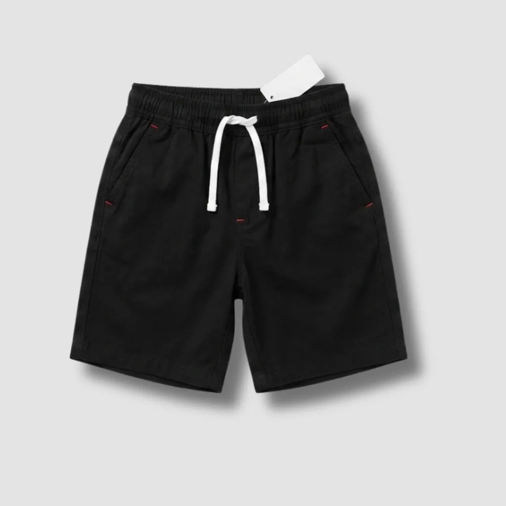 Black drawstring shorts with red accents and a white drawstring, made of a soft, stretchy fabric, perfect for casual wear or lounging.